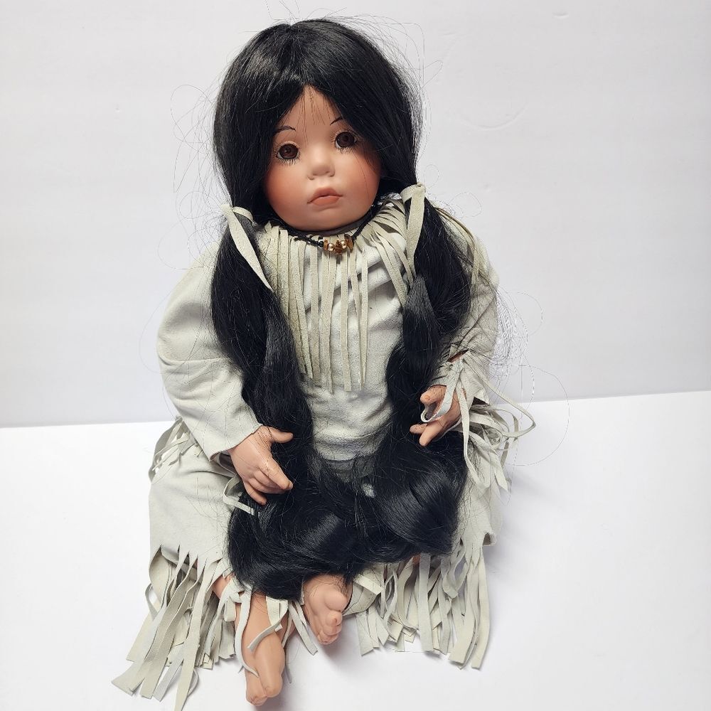 Sitting Native American Porcelain Weighted Doll 12"